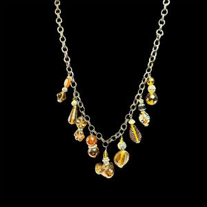 Neat Amber Glass Charm Necklace See each set of Beads...Unusual Chain, too.